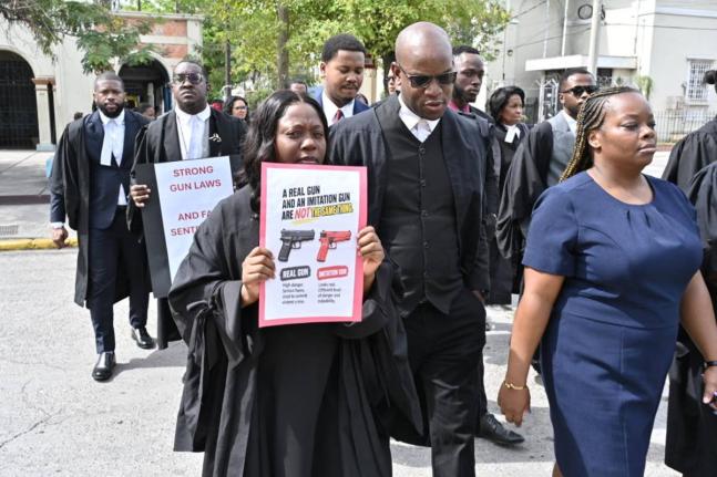 Lawyers stage silent protest at the Supreme Court Complex in Kingston and the Western Regional Gun Court on Wednesday over provisions of Jamaica’s Firearms Act. – Rudolph Brown photo