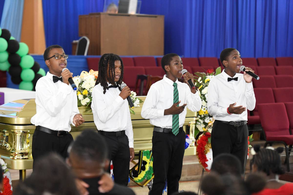 Calabar Quartet delivers a song selection at the funeral for veteran broadcaster Dervan Malcolm.