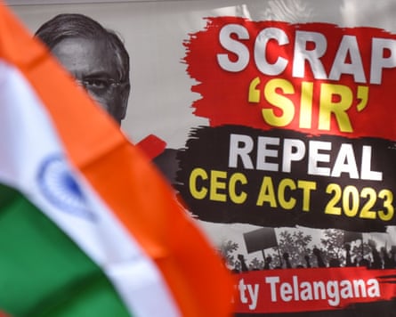 A protester waves an Indian national flag beside a banner depicting India’s chief election commissioner, Gyanesh Kumar during a sit-in protest in Hyderabad on Saturday.