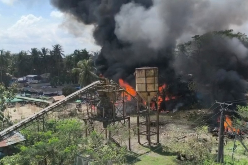 Smoke rises as fire burns following a Myanmar military airstrike, according to a rebel group that controls the area and a local aid worker, in Kyauktaw, Rakhine State, Myanmar, in this screen grab obtained from a social media video released September 28, 2026. (Social Media/via Reuters)