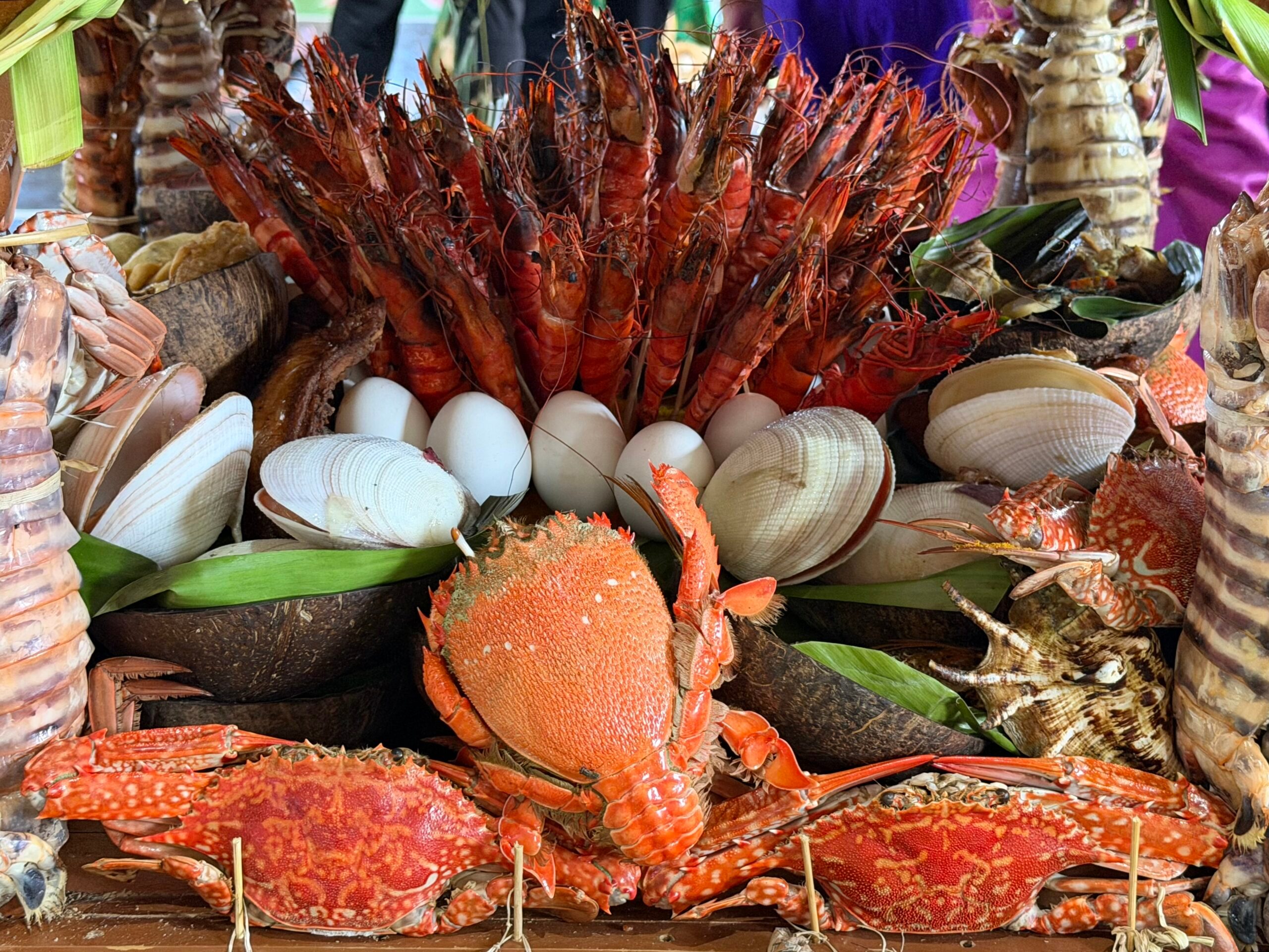 Prawns, crabs, shellfish, eggs, and other ingredients crowd one of the elaborate displays at the Maligay and Dulang Festival in Bongao.